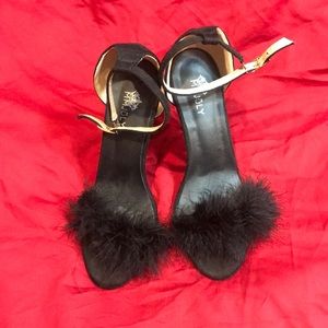 MM July. feathered all black. Size 42.